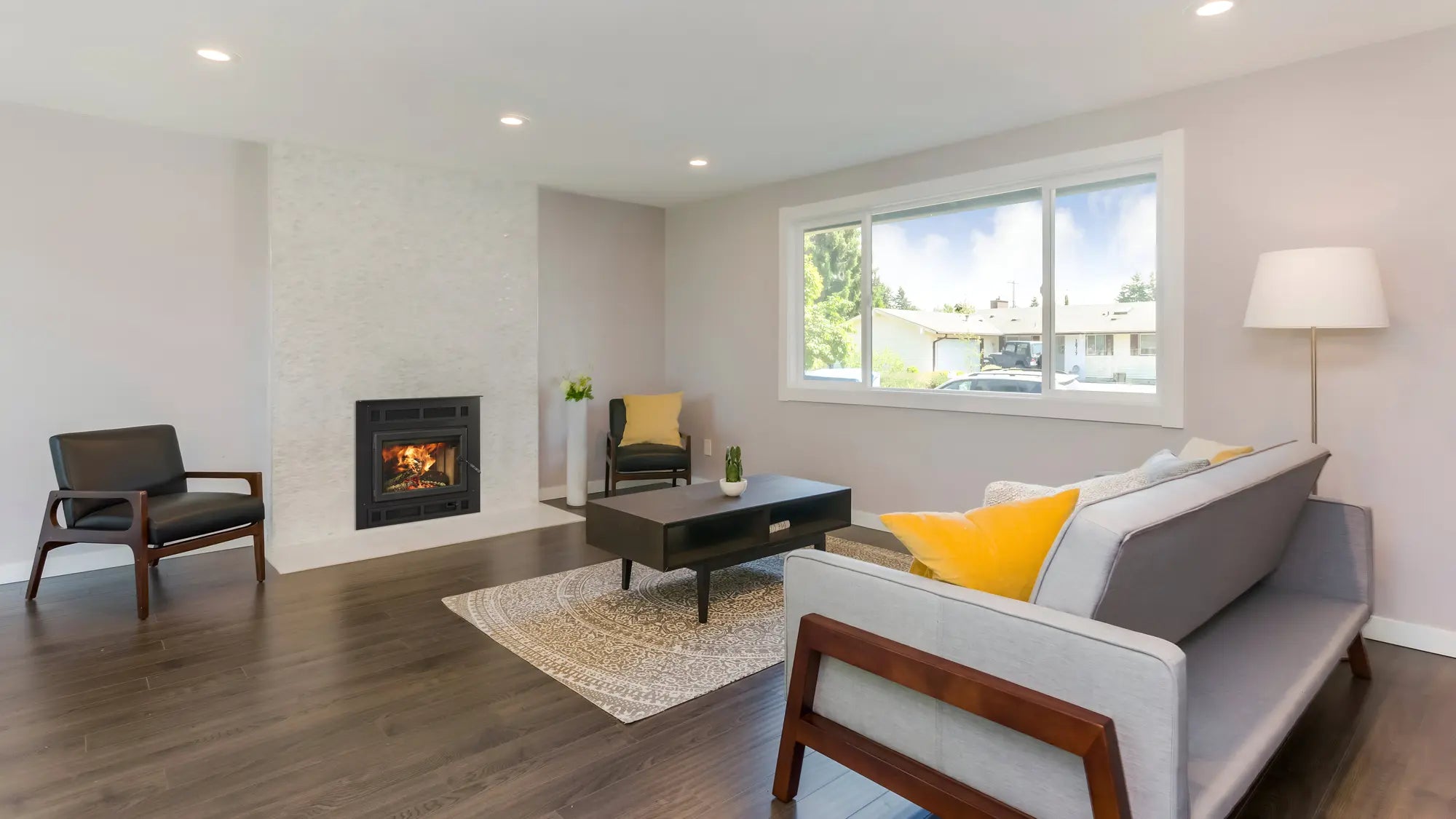 Majestic Pioneer II Wood Fireplace, with classic black front and single arch door  Majestic